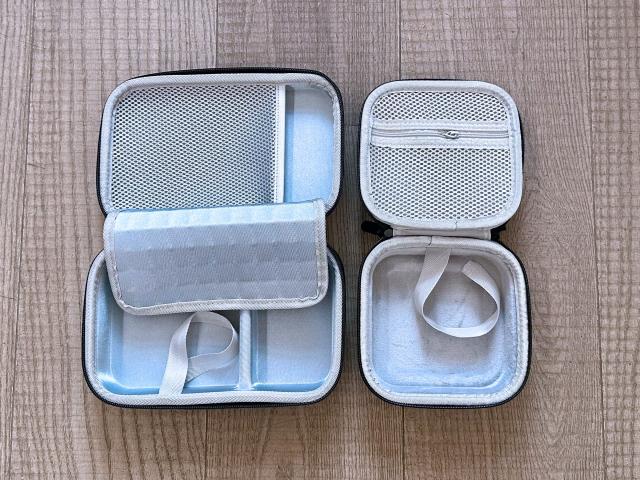 Ein größerer und ein kleinerer Mac mini Koffer im geöffneten Zustand